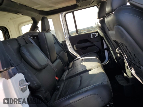 2022 Jeep Wrangler Unlimited Rubicon with VIN 1C4JJXR63NW206144, listed as a Copart auction lot 47234895 with 5,876 mi miles and Salvage title. Bid and sale history available at DreamBid. Image 10.