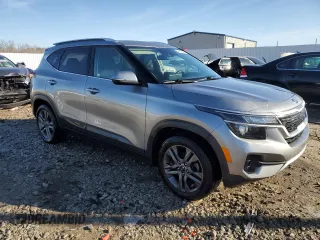 2021 Kia Seltos S with VIN KNDEU2AA7M7053823, listed as a Copart auction lot 49922315 with 51,701 mi miles and Salvage Title. Bid and sale history available at DreamBid. Image 4.