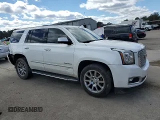 2016 GMC Yukon Denali with VIN 1GKS1CKJ4GR180185, listed as a Copart auction lot 47815835 with 197,506 mi miles and Salvage Title. Bid and sale history available at DreamBid. Image 4.