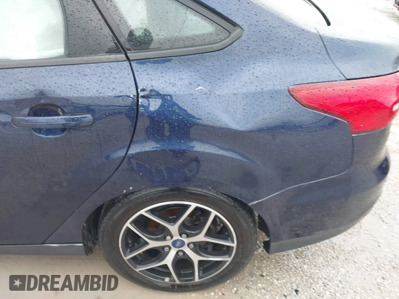 2017 Ford Focus SEL with VIN 1FADP3H29HL312631, listed as a IAAI auction lot 41226591 with 133,814 mi miles. Bid and sale history available at carsss.com. Image 22.
