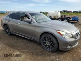 2011 Infiniti M with VIN JN1BY1ARXBM370844, listed as a Copart auction lot 62425515 with 277,315 mi miles and Salvage title. Bid and sale history available at DreamBid. Image 4.