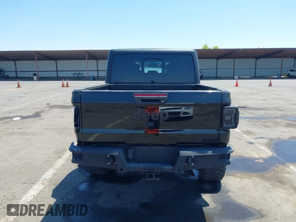 2020 Jeep Gladiator Sport S with VIN 1C6HJTAGXLL123540, listed as a IAAI auction lot 42453999 with 27,855 mi miles and . Bid and sale history available at DreamBid. Image 17.