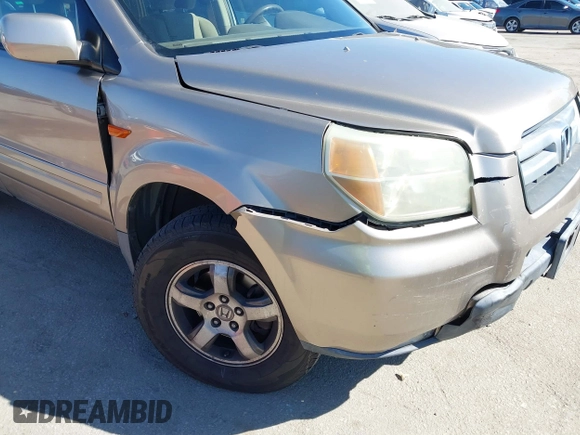 2006 Honda Pilot EX with VIN 5FNYF28416B017534, listed as a IAAI auction lot 41656789 with 241,343 mi miles and . Bid and sale history available at DreamBid. Image 6.