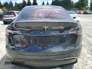 2024 Tesla Model Y с VIN 7SAYGDED1RF053003, выставлен на аукционе Copart как лот 63120195 с пробегом 8 679 миль миль и Списание • Salvage title. История ставок и продаж доступна на DreamBid. Изображение 6.