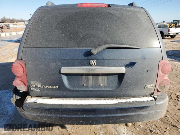2005 Dodge Durango SLT z VIN 1D4HD48D45F509957, wystawiony jako Copart lot #45083915 z przebiegiem 334 568 mil mil oraz Szkoda całkowita • Salvage title. Historia ofert i sprzedaży dostępna na DreamBid. Obrazek 6.