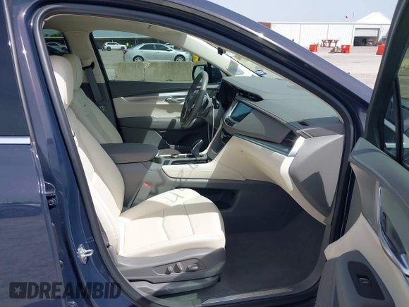 2024 Cadillac XT5 FWD Premium Luxury with VIN 1GYKNCR41RZ738779, listed as a IAAI auction lot 42266837 with 3,166 mi miles and . Bid and sale history available at DreamBid. Image 5.