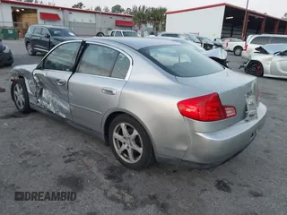 2003 Infiniti G35 w/Leather z VIN JNKCV51E03M010450, wystawiony jako IAAI lot #41881324 z przebiegiem 80 289 mil mil oraz . Historia ofert i sprzedaży dostępna na DreamBid. Obrazek 3.