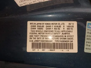 2012 Honda CR-Z EX with VIN JHMZF1D6XCS004087, listed as a IAAI auction lot 41860837 with 170,790 mi miles. Bid and sale history available at carsss.com. Image 9.