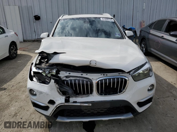 2019 BMW X1 xDrive28i with VIN WBXHT3C59K5L90317, listed as a Copart auction lot 61028125 with 46,789 mi miles and Salvage title. Bid and sale history available at DreamBid. Image 5.