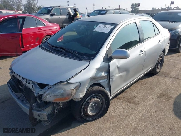 2010 Toyota Yaris with VIN JTDBT4K37A4076727, listed as a IAAI auction lot 41023533 with 102,494 mi miles. Bid and sale history available at carsss.com. Image 2.