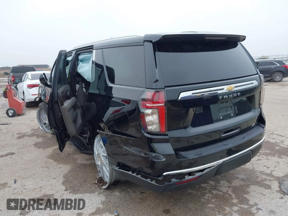 2021 Chevrolet Tahoe LT with VIN 1GNSCNKDXMR172381, listed as a IAAI auction lot 42168263 with 89,112 mi miles and . Bid and sale history available at DreamBid. Image 3.