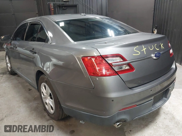 2015 Ford Police Interceptor z VIN 1FAHP2MK4FG119536, wystawiony jako IAAI lot #41635340 z przebiegiem 165 322 mil mil oraz . Historia ofert i sprzedaży dostępna na DreamBid. Obrazek 3.