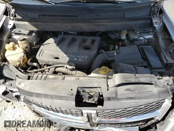 2013 Dodge Journey American Value with VIN 3C4PDCAB1DT715799, listed as a Copart auction lot 52404815 with 185,559 mi miles and Salvage Title. Bid and sale history available at DreamBid. Image 12.