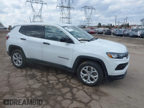 2024 Jeep Compass Sport z VIN 3C4NJDAN2RT157145, wystawiony jako IAAI lot #41456201 z przebiegiem 6 943 mil mil oraz . Historia ofert i sprzedaży dostępna na DreamBid. Obrazek 1.