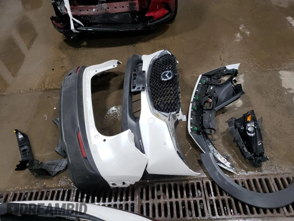 2023 Mazda CX-30 Premium Plus with VIN 3MVDMBEY3PM587798, listed as a Copart auction lot 86524444 with 9,860 mi miles and Salvage title. Bid and sale history available at DreamBid. Image 13.