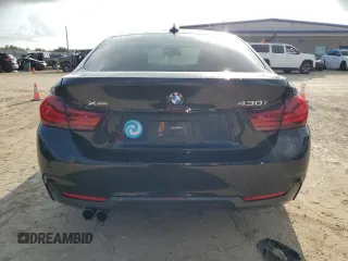 2020 BMW 4 Series 430i xDrive z VIN WBA4J3C05LCD23037, wystawiony jako Copart lot #73734954 z przebiegiem Nie podano mil oraz Nie do naprawy • Non repairable. Historia ofert i sprzedaży dostępna na DreamBid. Obrazek 6.