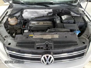 2013 Volkswagen Tiguan SE z VIN WVGBV3AX1DW579506, wystawiony jako Copart lot #52719575 z przebiegiem 163 471 mil mil oraz Szkoda całkowita • Salvage title. Historia ofert i sprzedaży dostępna na DreamBid. Obrazek 13.