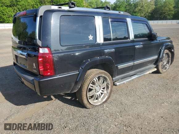 2010 Jeep Commander Limited with VIN 1J4RG5GT1AC129682, listed as a Copart auction lot 55215375 with 36,906 mi miles and Salvage title. Bid and sale history available at DreamBid. Image 3.