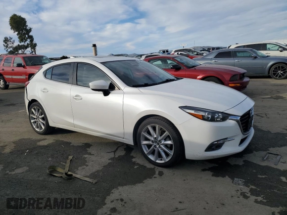 2017 Mazda 3 Grand Touring with VIN JM1BN1M38H1130635, listed as a Copart auction lot 87492534 with 72,164 mi miles and Salvage Title. Bid and sale history available at DreamBid. Image 4.