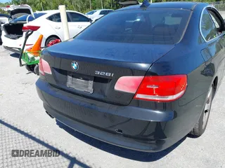 2010 BMW 3 Series 328i with VIN WBAWV1C58AP124385, listed as a IAAI auction lot 41761958 with 197,944 mi miles. Bid and sale history available at carsss.com. Image 17.