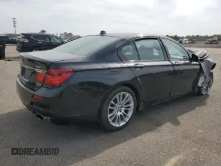 2015 BMW 7 Series 750i xDrive with VIN WBAYB6C59FD965994, listed as a Copart auction lot 53994545 with 119,929 mi miles and Salvage Title. Bid and sale history available at carsss.com. Image 3.