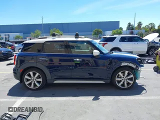 2017 MINI Countryman Cooper S z VIN WMZYT3C39H3D97769, wystawiony jako IAAI lot #42794779 z przebiegiem 126 880 mil mil oraz . Historia ofert i sprzedaży dostępna na DreamBid. Obrazek 14.