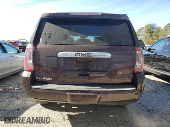 2017 GMC Yukon Denali with VIN 1GKS2CKJ5HR229277, listed as a Copart auction lot 87868105 with 95,714 mi miles and Salvage Title. Bid and sale history available at carsss.com. Image 6.