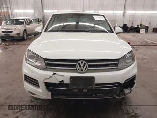 2013 Volkswagen Touareg Lux with VIN WVGEF9BP5DD011511, listed as a IAAI auction lot 41608840 with 167,350 mi miles and . Bid and sale history available at DreamBid. Image 13.