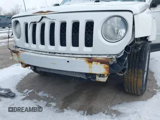 2014 Jeep Patriot Latitude with VIN 1C4NJPFA6ED502457, listed as a IAAI auction lot 41334385 with 160,600 mi miles and . Bid and sale history available at carsss.com. Image 6.