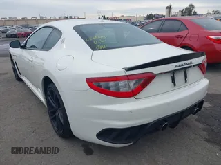 2012 Maserati GranTurismo MC Stradale with VIN ZAM45MLA9C0065671, listed as a IAAI auction lot 40990883 with 27,041 mi miles. Bid and sale history available at carsss.com. Image 3.