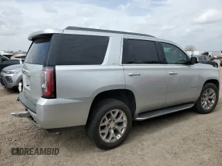 2015 GMC Yukon SLT with VIN 1GKS1BKC2FR661854, listed as a Copart auction lot 48418105 with 169,970 mi miles and Salvage Title. Bid and sale history available at carsss.com. Image 3.