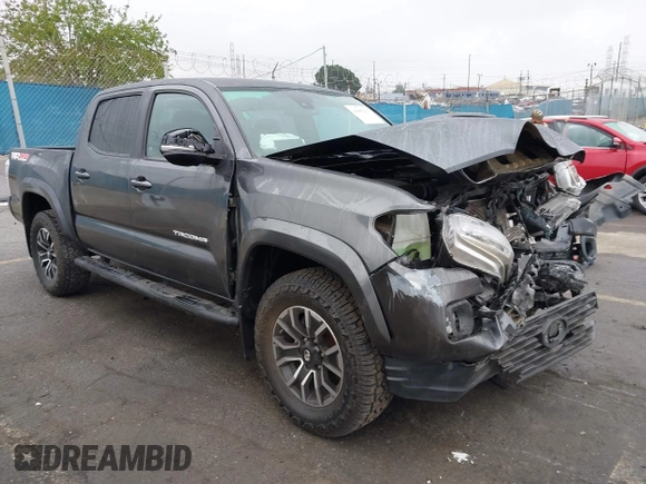 2020 Toyota Tacoma SR5 z VIN 3TMCZ5AN6LM323920, wystawiony jako IAAI lot #41885427 z przebiegiem 153 952 mil mil oraz . Historia ofert i sprzedaży dostępna na DreamBid. Obrazek 1.