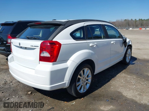 2011 Dodge Caliber Heat with VIN 1B3CB5HA6BD179014, listed as a IAAI auction lot 41704508 with 188,127 mi miles and . Bid and sale history available at DreamBid. Image 4.