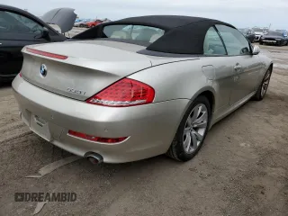 2009 BMW 6 Series 650i with VIN WBAEB53599CX64829, listed as a Copart auction lot 75694824 with 0 mi miles and Salvage Title. Bid and sale history available at carsss.com. Image 3.