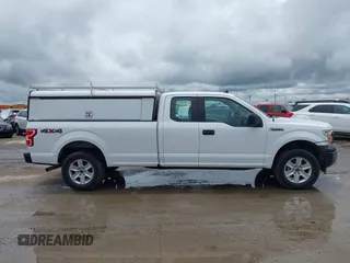 2020 Ford F-150 XL with VIN 1FTFX1E52LKD23054, listed as a IAAI auction lot 42434983 with 132,261 mi miles and . Bid and sale history available at DreamBid. Image 13.