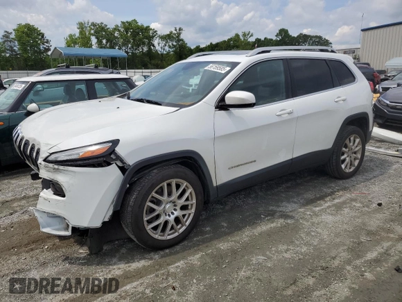 2014 Jeep Cherokee Limited with VIN 1C4PJLDB1EW301647, listed as a Copart auction lot 56169585 with 140,784 mi miles and Salvage title. Bid and sale history available at DreamBid. Image 1.