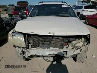 2002 Jeep Grand Cherokee Limited with VIN 1J4GX58S32C320843, listed as a Copart auction lot 77663864 with 289,537 mi miles and Salvage Title. Bid and sale history available at DreamBid. Image 12.