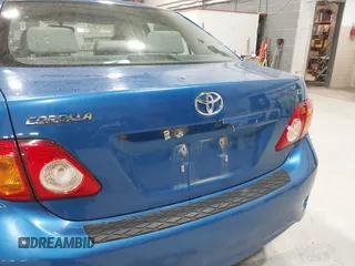 2009 Toyota Corolla with VIN JTDBL40E699037792, listed as a IAAI auction lot 41838231 with 199,690 mi miles. Bid and sale history available at carsss.com. Image 14.