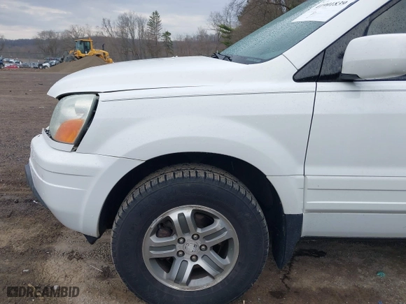 2004 Honda Pilot EX with VIN 2HKYF185X4H571558, listed as a IAAI auction lot 41901839 with 196,703 mi miles. Bid and sale history available at carsss.com. Image 14.