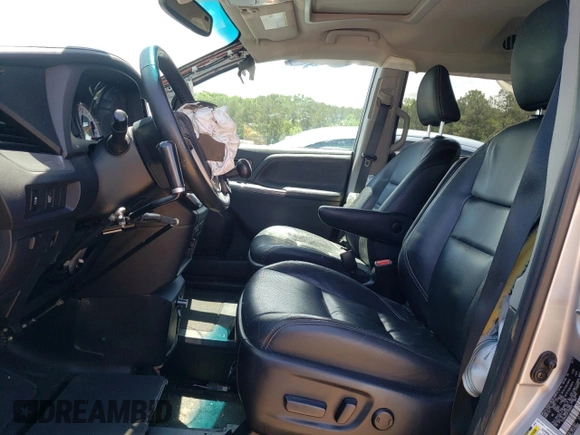 2015 Toyota Sienna SE with VIN 5TDXK3DCXFS580975, listed as a Copart auction lot 56309505 with 154,073 mi miles and Salvage title. Bid and sale history available at DreamBid. Image 7.