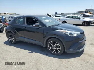 2018 Toyota C-HR XLE with VIN NMTKHMBXXJR044779, listed as a Copart auction lot 59895875 with 135,761 mi miles and Clean title. Bid and sale history available at DreamBid. Image 4.