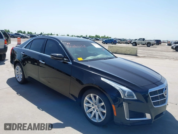 2014 Cadillac CTS Luxury RWD z VIN 1G6AR5SX3E0196348, wystawiony jako IAAI lot #42282732 z przebiegiem 130 956 mil mil oraz . Historia ofert i sprzedaży dostępna na DreamBid. Obrazek 1.