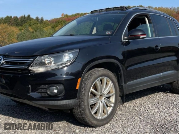 2013 Volkswagen Tiguan SE z VIN WVGBV7AX3DW544490, wystawiony jako Copart lot #82038874 z przebiegiem 149 169 mil mil oraz Czysty tytuł • Clean title. Historia ofert i sprzedaży dostępna na DreamBid. Obrazek 2.