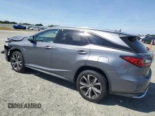 2020 Lexus RX 350L with VIN JTJHZKFA4L2027079, listed as a Copart auction lot 57151485 with 60,890 mi miles and Salvage title. Bid and sale history available at DreamBid. Image 2.