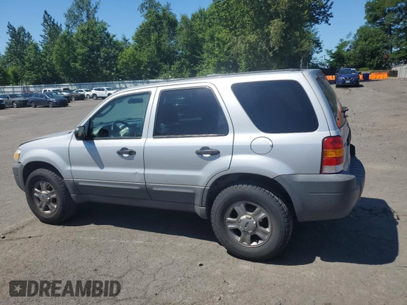 2005 Ford Escape XLS Value with VIN 1FMYU92Z55KC93604, listed as a Copart auction lot 60104145 with 86,788 mi miles and Salvage title. Bid and sale history available at DreamBid. Image 2.