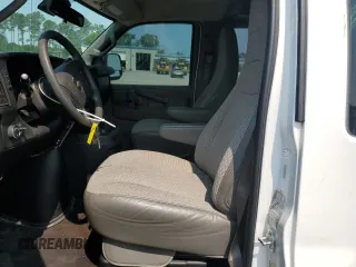 2019 Chevrolet Express Passenger LT with VIN 1GAZGPFG6K1263857, listed as a Copart auction lot 58987635 with 127,347 mi miles and Salvage title. Bid and sale history available at DreamBid. Image 7.