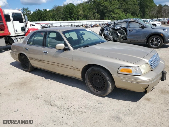 2000 Ford Crown Victoria with VIN 2FAFP73W0YX127395, listed as a Copart auction lot 72442494 with 123,999 mi miles and Salvage Title. Bid and sale history available at carsss.com. Image 4.