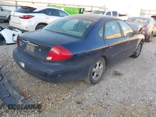 2001 Ford Taurus SES with VIN 1FAFP55U81G174122, listed as a IAAI auction lot 40973418 with 173,802 mi miles. Bid and sale history available at carsss.com. Image 4.