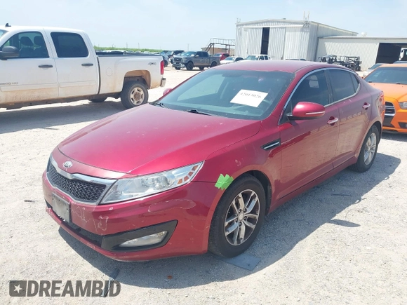 2013 Kia Optima LX with VIN 5XXGM4A7XDG247696, listed as a IAAI auction lot 42013026 with 119,209 mi miles. Bid and sale history available at carsss.com. Image 2.