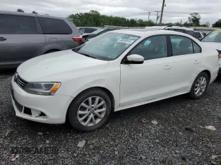 2013 Volkswagen Jetta SE with VIN 3VWDP7AJ8DM277587, listed as a Copart auction lot 58093815 with 136,608 mi miles and Salvage title. Bid and sale history available at DreamBid. Image 1.